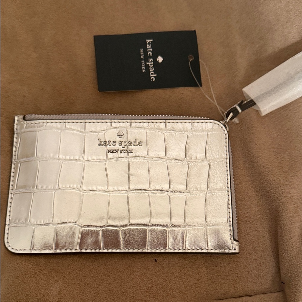 Kate Spade Metallic Silver Embossed Wristlet